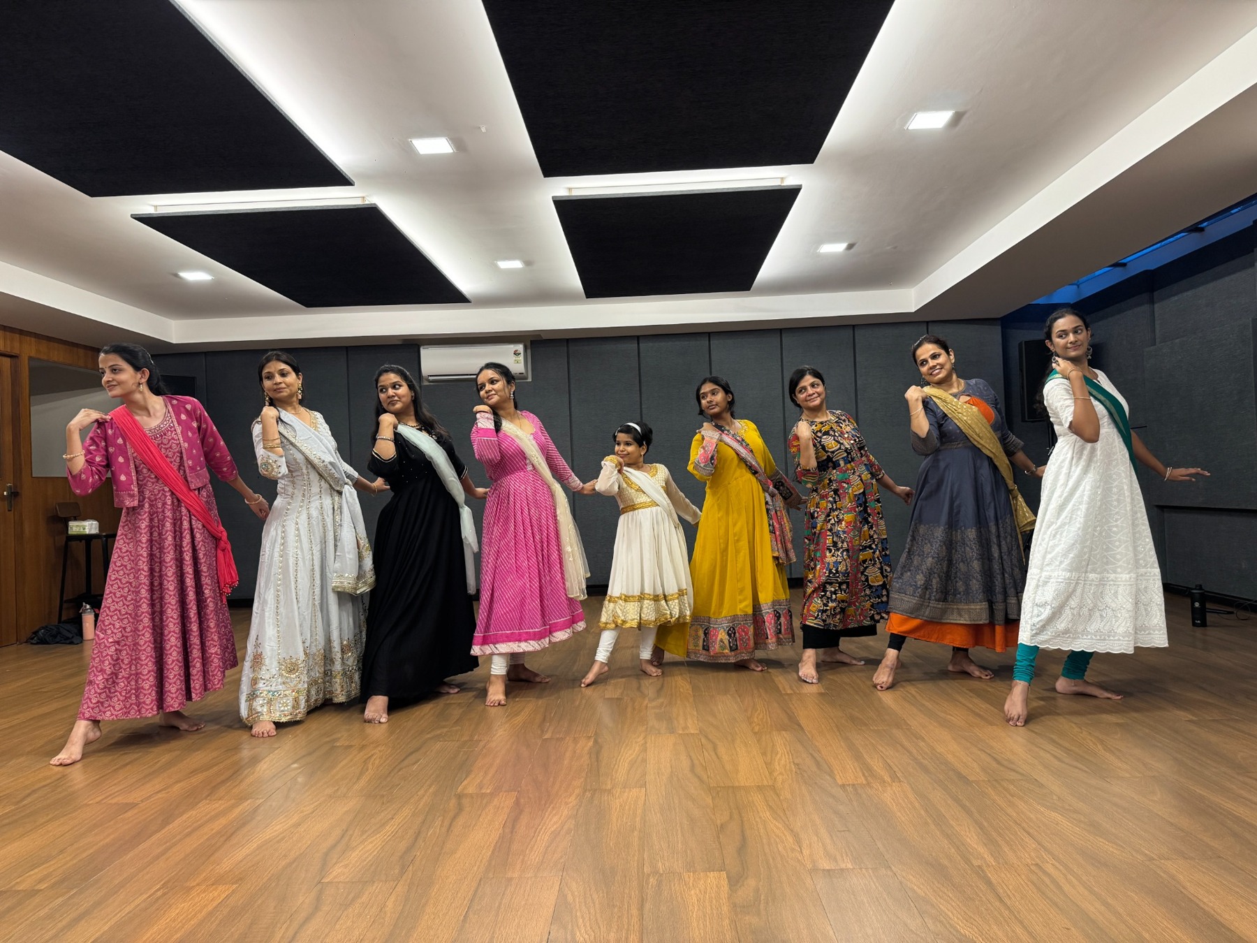 Kathak dancers practising together in the studio.